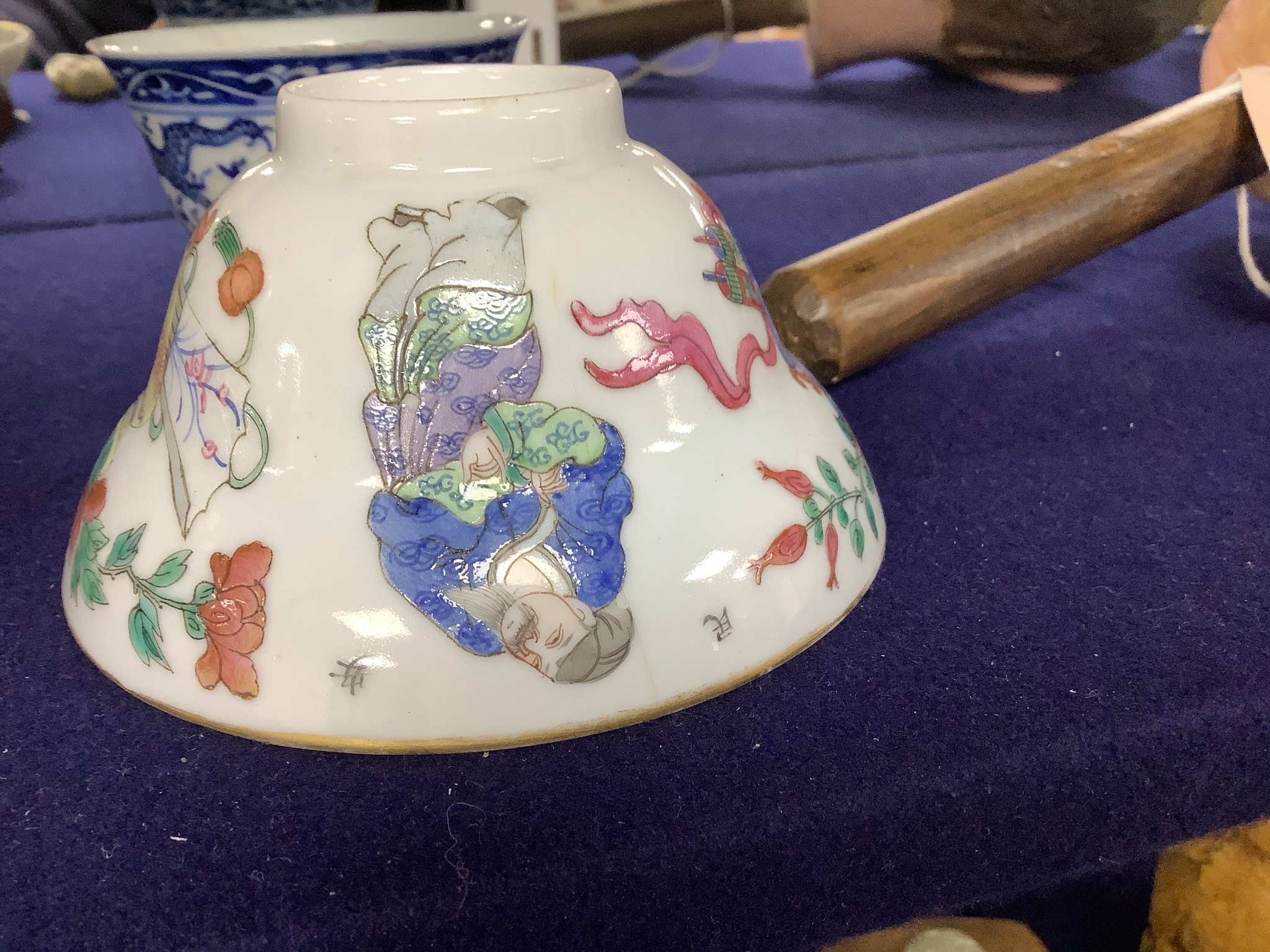 A 19th century famille rose bowl and stand, a blue and white cup, a famille rose jar and a stone carving of two monkeys